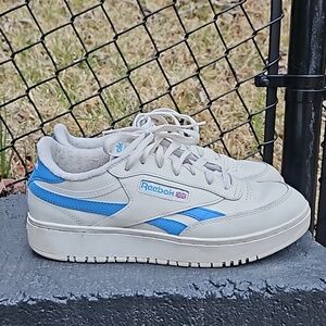 Blue and white vintage style reebok sneakers